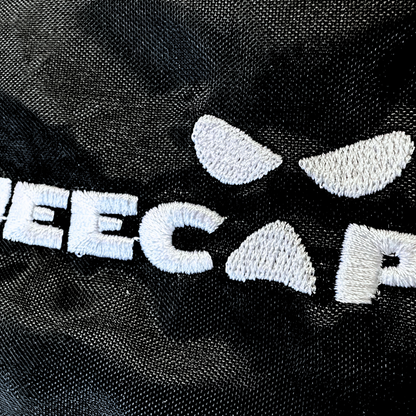Kneecap bumbag in black with white logo embroidered